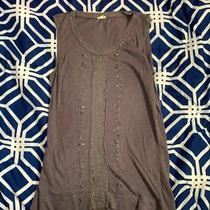Grey top with rhinestones.